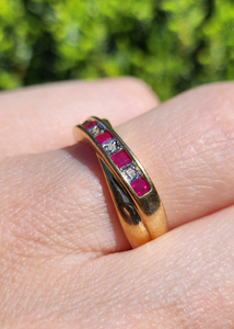 1380: Vintage: 9ct Gold Rubies Diamonds Crossover Ring- sparkling symmetry