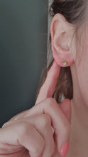 Load and play video in Gallery viewer, 7269:Vintage Rare: Platinum Peridot Stud Earrings- crisp platinum showcasing gorgeous green peridots
