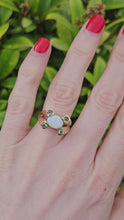 Load and play video in Gallery viewer, 1301: Vintage: 9ct Gold Cabochon White Opal Peridot Cocktail Ring- Lovely symmetry
