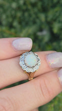Load and play video in Gallery viewer, 18ct Gold Vivid White Opal 12 Natural Diamonds Halo Ring- From 1975
