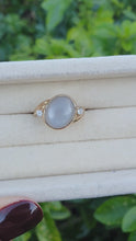 Load and play video in Gallery viewer, 7060: Vintage: 9ct Gold Large White Moonstone Sapphire Accents Cocktail Ring- lovely colours
