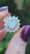 Load and play video in Gallery viewer, 2564: Vintage 9ct Gold 15 White Opals 12 Diamonds Cluster Ring
