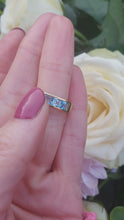 Load and play video in Gallery viewer, 7125: Vintage: 18ct Gold Channel Set Swiss Blue Topaz Ring- lovely cut and colours
