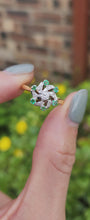 Load and play video in Gallery viewer, 6066: Vintage: 18ct Gold 6 Emeralds 7 Brilliant Cut Diamonds Cluster Ring- a rare find
