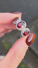 Load and play video in Gallery viewer, 6345  Vintage: 9ct Gold Garnets Diamonds Trilogy Ring
