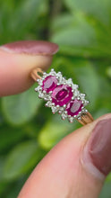 Load and play video in Gallery viewer, 2180: Vintage: 9ct Gold Rich Red Ruby Trilogy 18 Diamonds Dress Ring
