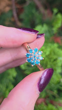 Load and play video in Gallery viewer, 6348 Vintage; Rare 9ct Gold Blue Diamonds Flower Head Ring- 15 natural, sparkling diamonds
