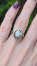 Load and play video in Gallery viewer, 2536: Vintage 9ct Gold Cabochon Cut White Opal 14 Natural Diamonds Cluster Ring
