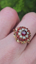 Load and play video in Gallery viewer, 1420: Vintage: 9ct Gold Garnets Seed Pearls Flower Head Ring- From 1973
