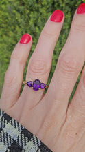 Load and play video in Gallery viewer, 1205: Vintage: 18ct Gold Purple Amethysts Trilogy Ring- Lush
