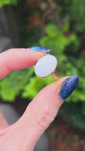 Load and play video in Gallery viewer, 1847: Vintage; 9ct Gold Oval Cabochon White Opal Solitaire- lovely colour play
