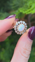 Load and play video in Gallery viewer, 2536: Vintage 9ct Gold Cabochon Cut White Opal 14 Natural Diamonds Cluster Ring
