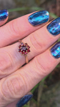 Load and play video in Gallery viewer, 0118 Vintage: 9ct Gold 9 Garnets Daisy Flower Head Ring- From 1975
