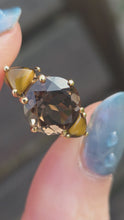 Load and play video in Gallery viewer, 2872: Vintage 9ct Gold Smokey Quartz Tigers Eye Trilogy Ring
