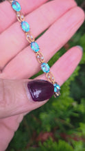 Load and play video in Gallery viewer, 2110: Vintage 9ct Gol Swiss Blue Topaz Diamonds Bracelet (18.5cm)
