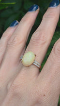 Cargar y reproducir el video en el visor de la galería, 2270 Vintage: 9ct Gold Oval cabochon White Opal 20 Natural Diamonds Cocktail Ring
