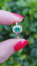 Load and play video in Gallery viewer, 7007:Vintage: 18ct Gold Oval Emerald 14 Brilliant Cut Diamonds Cluster Ring- lovely quality, hallmarked in London
