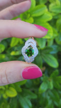 Load and play video in Gallery viewer, A8344: Vintage: Eye catching 9ct Gold Green Diopside 12 diamonds Halo Dress ring
