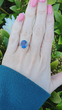 Load and play video in Gallery viewer, 7220:Vintage Rare: 10ct White  Gold Colour Change Blue Fluorite Cocktail Ring- lovely cut and colour array
