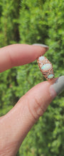 Load and play video in Gallery viewer, 1756: Antique: 9ct Rose Gold Vivid White Opals Diamonds Boat Ring- From 1912

