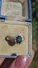 Load and play video in Gallery viewer, 1509: Vintage: 18ct Gold Green Garnet Diamonds Halo Cluster Ring- From 1972
