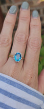 Load and play video in Gallery viewer, 1650: Vintage: 9ct Gold Swiss Blue Topaz 18 Diamonds Cluster Ring- sparkling beauty
