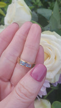 Load and play video in Gallery viewer, 7125: Vintage: 18ct Gold Channel Set Swiss Blue Topaz Ring- lovely cut and colours
