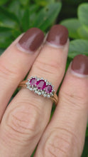 Load and play video in Gallery viewer, 2180: Vintage: 9ct Gold Rich Red Ruby Trilogy 18 Diamonds Dress Ring
