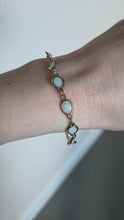 Load and play video in Gallery viewer, 2826: Vintage-  9ct Gold 12 Cabochon -Cut White Opals Link Bracelet (19cm)
