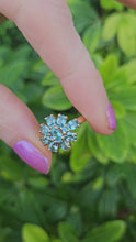 Load and play video in Gallery viewer, 0896: Vintage: 9ct Gold 11 Swiss Blue Topaz Flower Head Ring- inspired design
