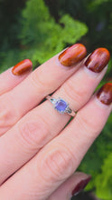 Load and play video in Gallery viewer, 2293 :18ct White Gold Violet Blue Tanzanite 16 Sparkling Diamonds Ring
