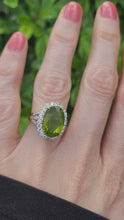 Load and play video in Gallery viewer, 0023: Vintage: 18ct Gold Voluptuous Peridot Brilliant Cut Diamonds Cluster Ring
