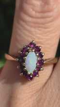 Cargar y reproducir el video en el visor de la galería, 1839: Vintage: 9ct Gold White Opal 12 Crimson Topaz Cluster Ring- From 1979
