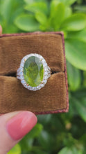 Load and play video in Gallery viewer, 0023: Vintage: 18ct Gold Voluptuous Peridot Brilliant Cut Diamonds Cluster Ring
