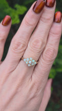 Load and play video in Gallery viewer, 2539: Vintage Petite 9 Cabochon Cut White Opals Flower Head Ring
