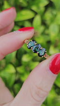 Load and play video in Gallery viewer, 1322: Vintage: Rare 9ct Gold Green Garnet Trilogy Ring lovely cut and colours
