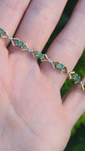 Load and play video in Gallery viewer, 2112: Vintage: 9ct Gold 14&nbsp; Emeralds 13 Diamonds Bracelet (18cm)- a natural beauty
