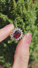 Load and play video in Gallery viewer, 1368: Vintage: 18ct Gold Pyrobe Garnet Diamonds Flower Head Ring- exceptional

