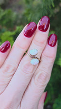 Load and play video in Gallery viewer, 2573: Vintage 14ct Gold Cabochon White Opals Bypass Ring
