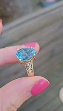 Load and play video in Gallery viewer, 0882: Vintage: 9ct Gold Large Pear Cut London Blue Topaz Cocktail Ring
