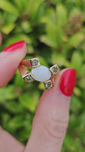 Load and play video in Gallery viewer, 1301: Vintage: 9ct Gold Cabochon White Opal Peridot Cocktail Ring- Lovely symmetry
