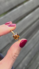 Load and play video in Gallery viewer, 2490 Vintage: Rare 9ct Gold Square Cut Orange Zircon Solitaire Ring
