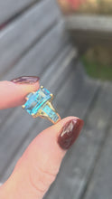 Load and play video in Gallery viewer, 6299 Vintage; 9ct Gold London Blue Topaz Emerald &amp; Princess Cut Cocktail Ring
