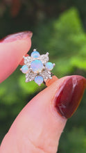 Load and play video in Gallery viewer, 2158: Vintage: 9ct Gold 7 White Opals Diamonds Flower Head Ring- From 1981
