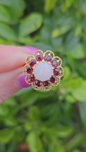 Load and play video in Gallery viewer, 0761: Vintage (1960&#39;s): 9ct Gold White Opal Garnets Cluster Ring - beautifully paired.
