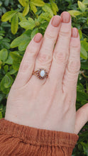 Load and play video in Gallery viewer, 7271- Vintage (1960&#39;s) Opal Garnets Halo Cocktail Ring- lovely combination
