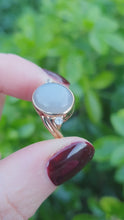 Load and play video in Gallery viewer, 7060: Vintage: 9ct Gold Large White Moonstone Sapphire Accents Cocktail Ring- lovely colours
