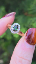 Load and play video in Gallery viewer, 6361 Vintage: 18ct Gold Green Garnet Diamonds Halo Cluster Ring- From 1972

