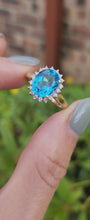 Load and play video in Gallery viewer, 1650: Vintage: 9ct Gold Swiss Blue Topaz 18 Diamonds Cluster Ring- sparkling beauty
