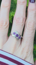 Load and play video in Gallery viewer, 2414: Vintage: 9ct White Gold Lilac Amethysts Bypass Ring
